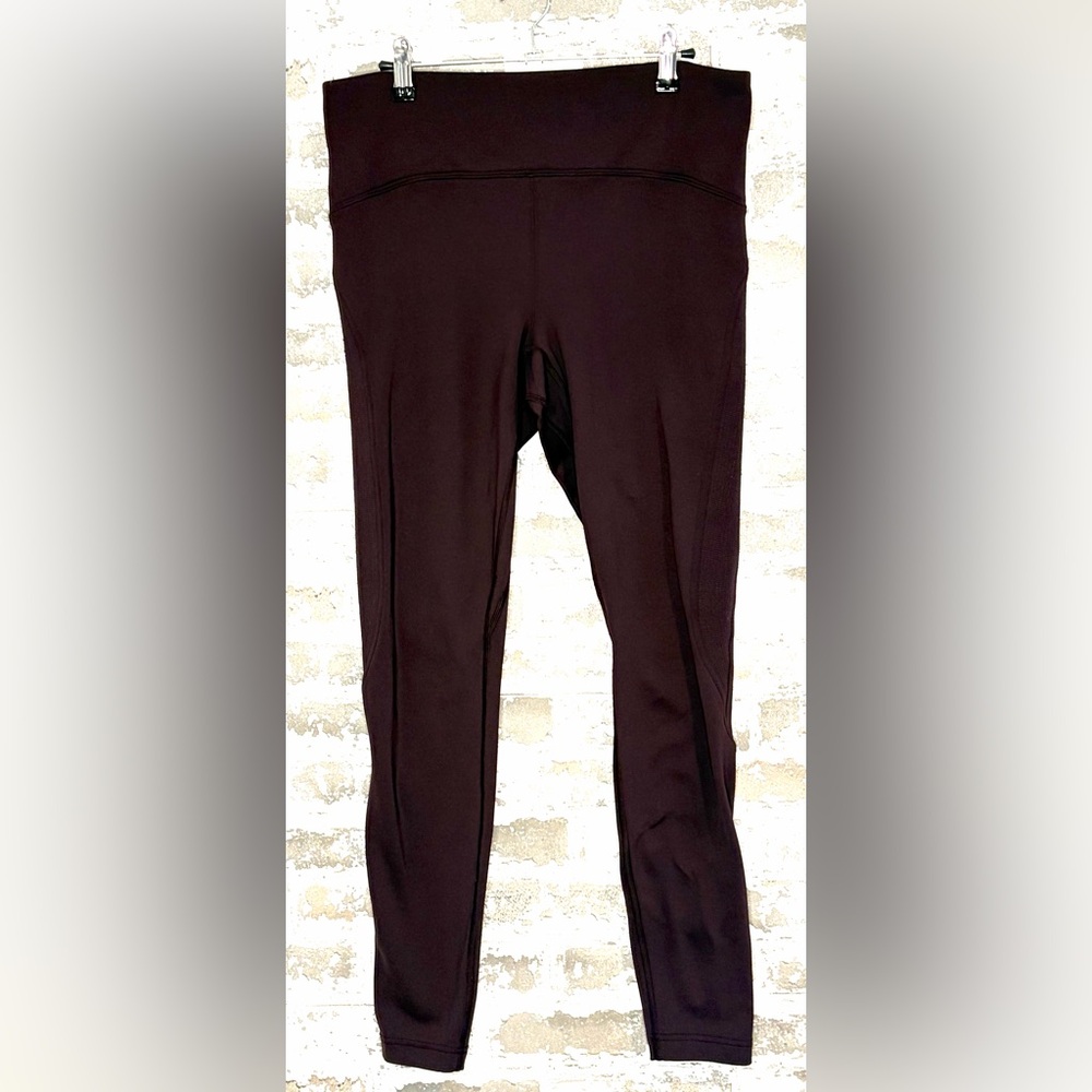 Women’s size 10 “black cherry” lululemon Fast as Fleece 28” tights